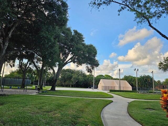 view of community with a lawn