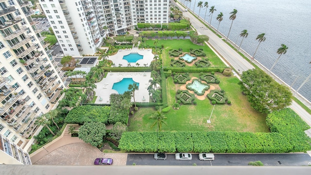 birds eye view of property featuring a water view