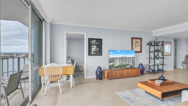 tiled living room featuring crown molding and a water view