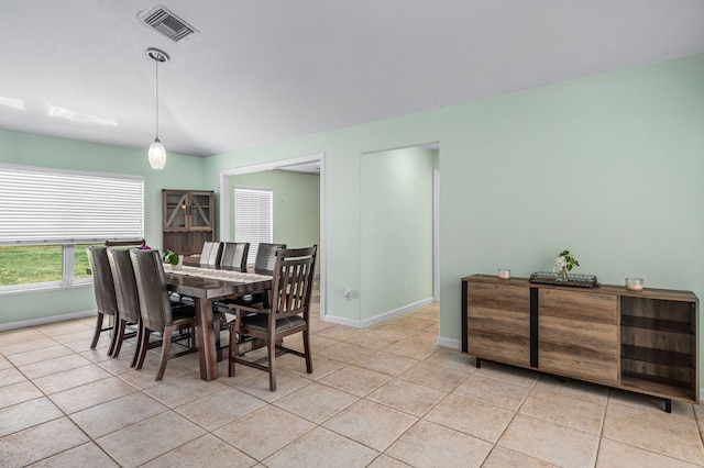 dining room featuring light tile patterned floors