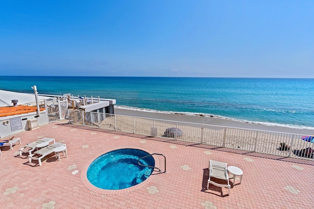 property view of water featuring a view of the beach