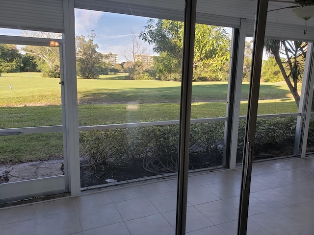 doorway to outside featuring light tile patterned floors