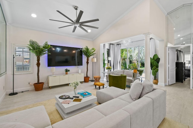 living room featuring ceiling fan, crown molding, and light hardwood / wood-style flooring