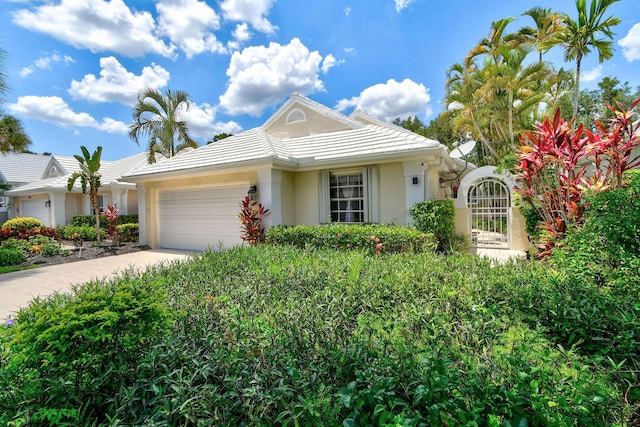 view of front of property with a garage