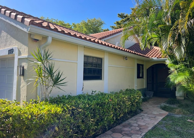 view of home's exterior featuring a garage