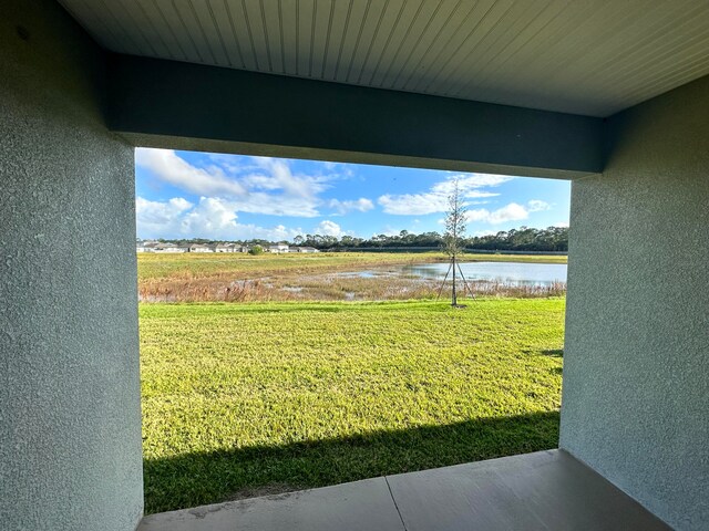 view of yard with a water view