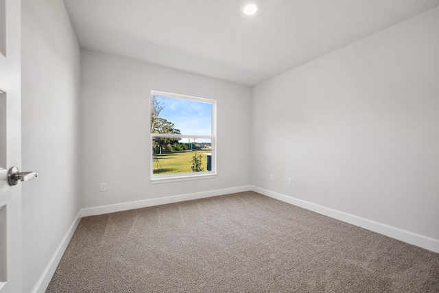 unfurnished room with carpet