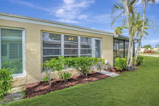 view of property exterior featuring a yard