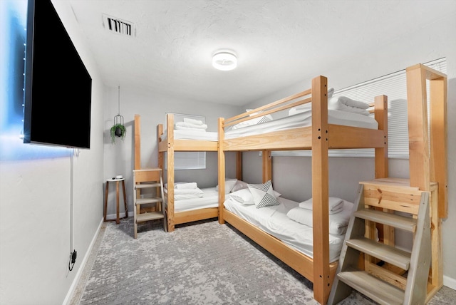 bedroom featuring carpet flooring