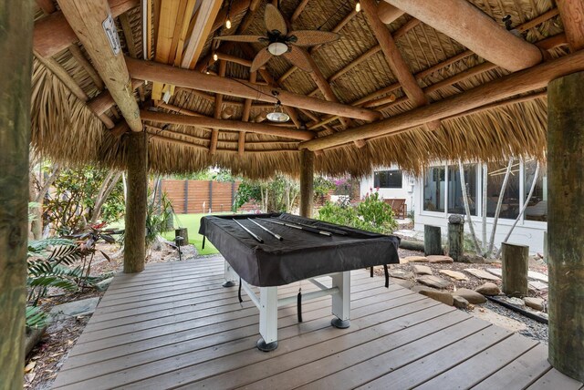 wooden deck featuring ceiling fan and a gazebo