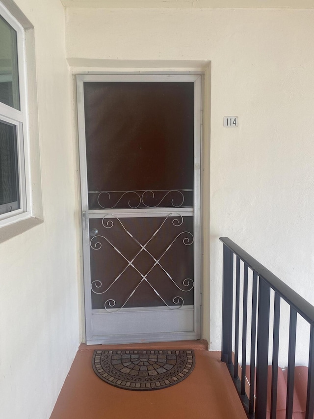 doorway to property with a balcony