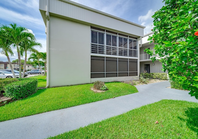 exterior space featuring a yard