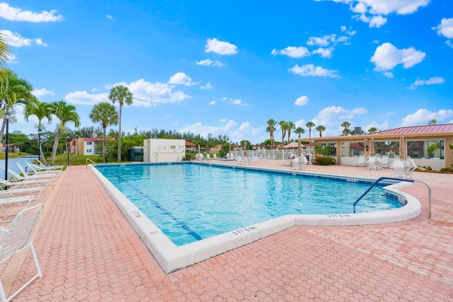 view of pool featuring a patio area