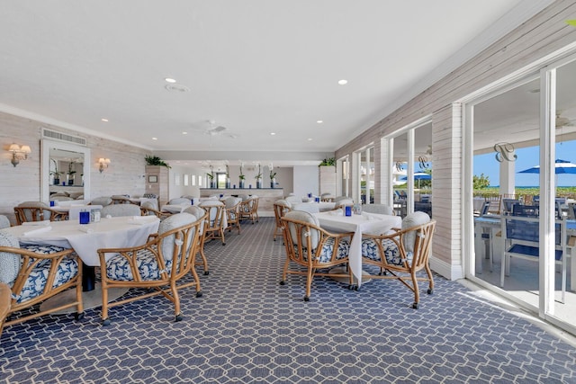 dining area with ceiling fan