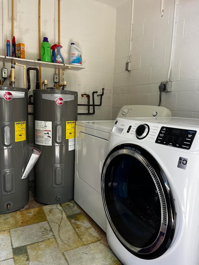 clothes washing area with electric water heater, washer and clothes dryer, and light tile patterned floors