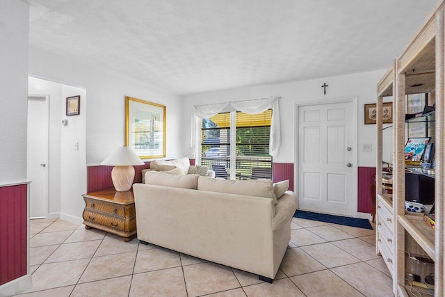 living area featuring light tile patterned flooring