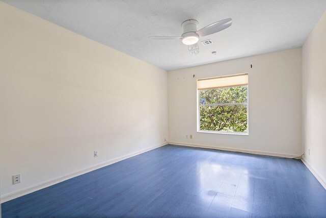 empty room featuring a textured ceiling, ceiling fan, and hardwood / wood-style floors