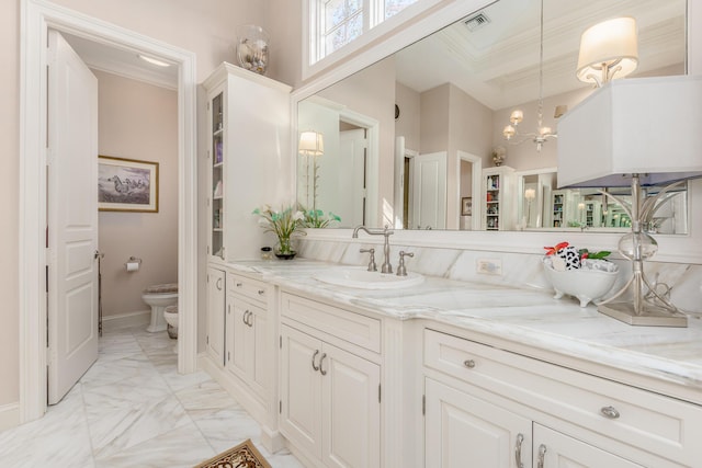 bathroom featuring a bidet, a notable chandelier, crown molding, and toilet