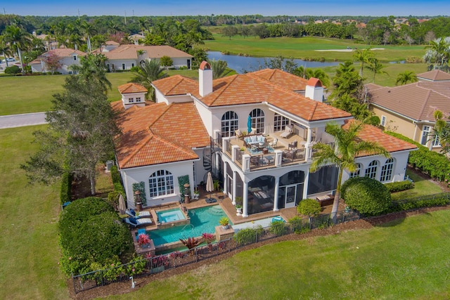 back of house with a patio and a sunroom