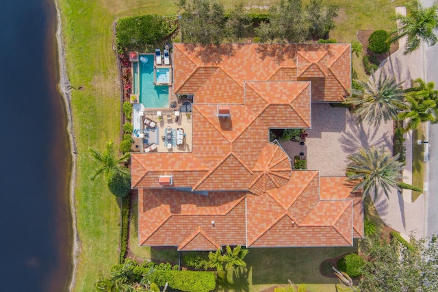 drone / aerial view with a water view