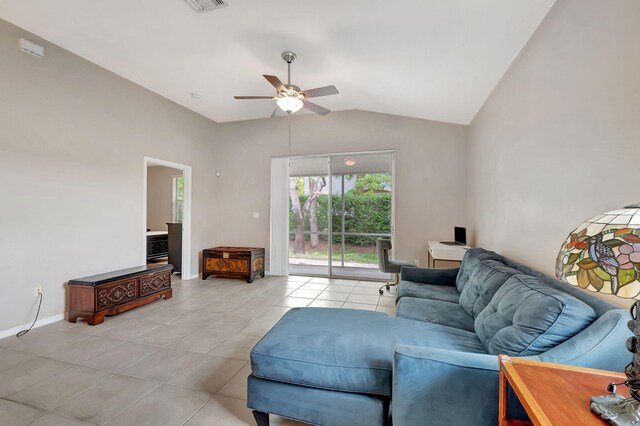 tiled living room with vaulted ceiling and ceiling fan