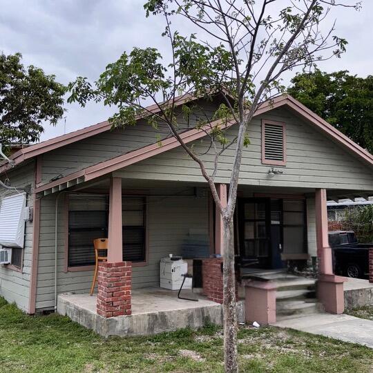 view of front of home featuring covered porch