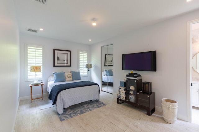 bedroom featuring light wood-type flooring