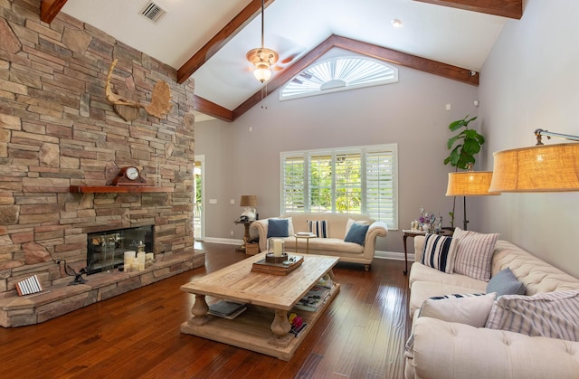 living room with high vaulted ceiling, dark hardwood / wood-style flooring, ceiling fan, and a fireplace