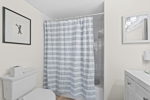 127 Yacht Club Way Unit 206, Hypoluxo, FL 33462 - full bath with toilet, vanity, and shower / bath combination with curtain