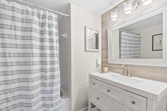 127 Yacht Club Way Unit 206, Hypoluxo, FL 33462 - full bathroom with shower / bathtub combination with curtain, decorative backsplash, and vanity