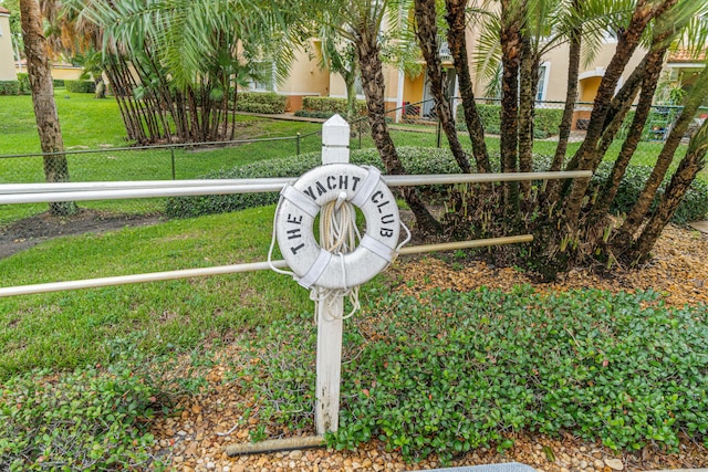 127 Yacht Club Way Unit 206, Hypoluxo, FL 33462 - exterior details with fence