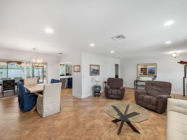 living room featuring a chandelier, light tile patterned floors, and ornamental molding