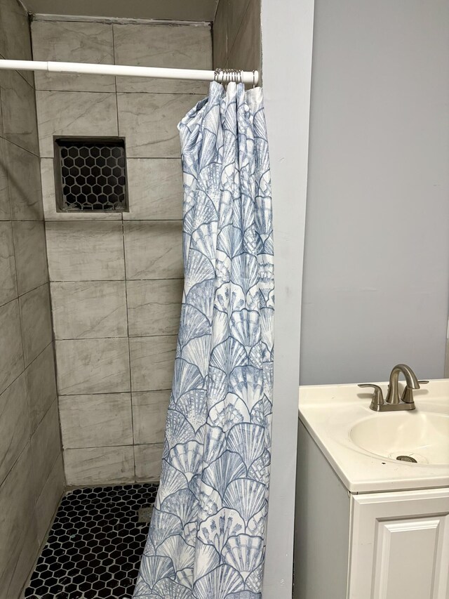 washroom featuring washing machine and dryer and light tile patterned floors