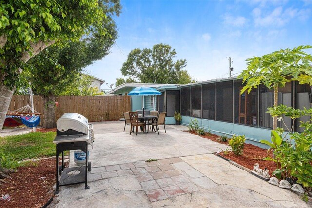 view of yard featuring a patio area and central air condition unit