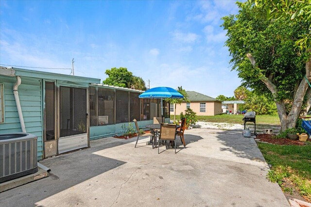 view of yard featuring a sunroom