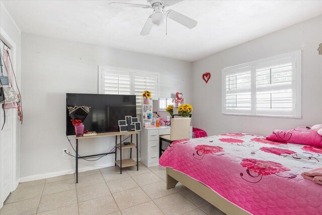 bedroom featuring light tile patterned flooring