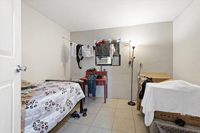 bathroom featuring tile patterned floors, vanity, and toilet