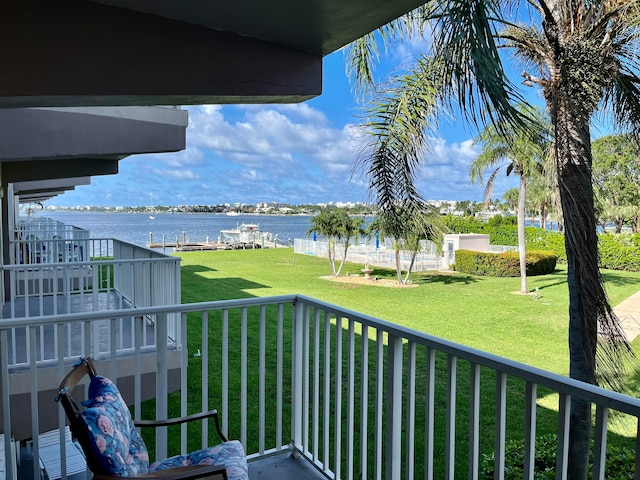 balcony featuring a water view