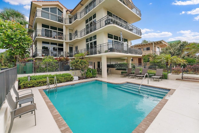 view of pool featuring a patio