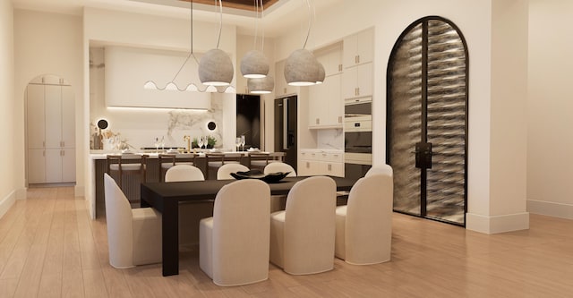 dining room with light hardwood / wood-style flooring