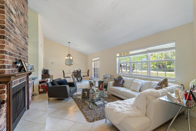 tiled living room with lofted ceiling, a brick fireplace, and brick wall