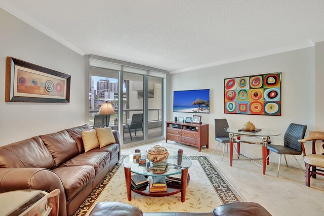 living room with floor to ceiling windows, tile flooring, ornamental molding, and a textured ceiling