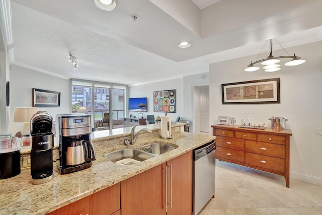 kitchen featuring light stone counters, dishwasher, hanging light fixtures, sink, and a textured ceiling