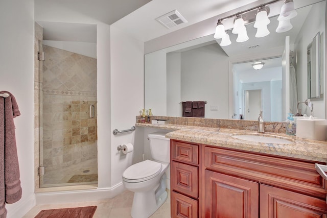 bathroom with a shower with shower door, vanity with extensive cabinet space, toilet, and tile floors