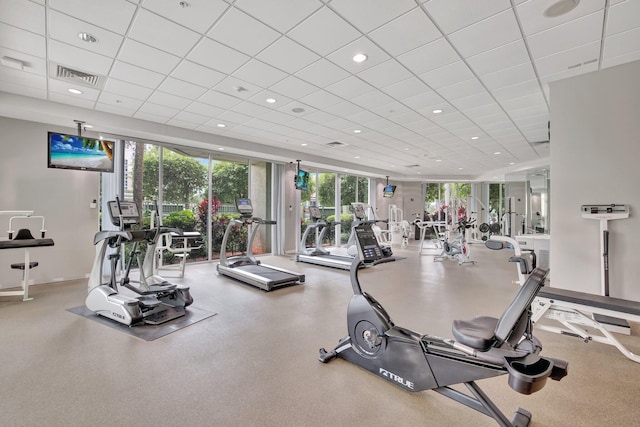 workout area with a drop ceiling