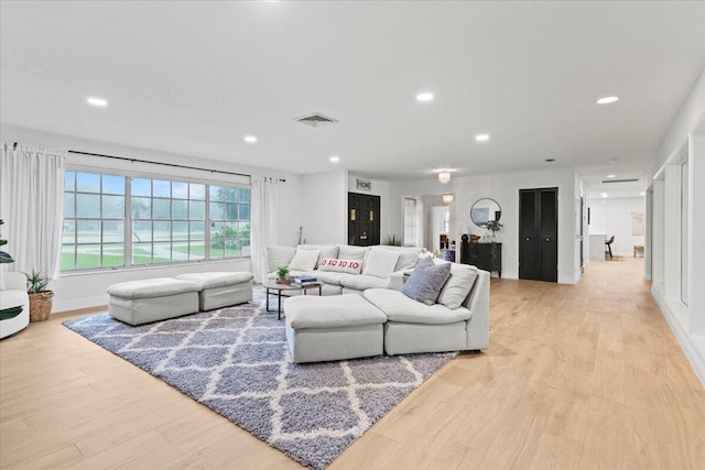 living room featuring light wood-type flooring