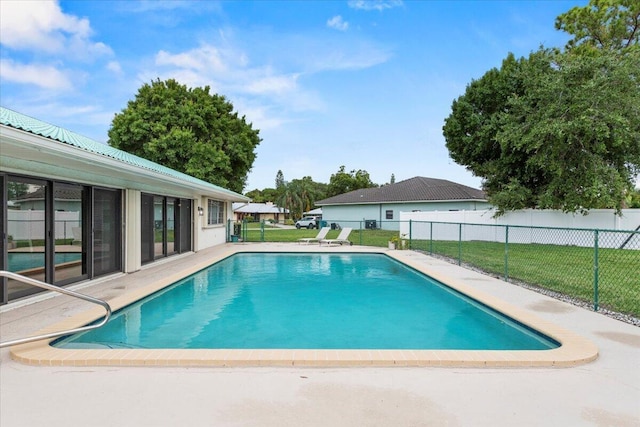 view of pool featuring a patio