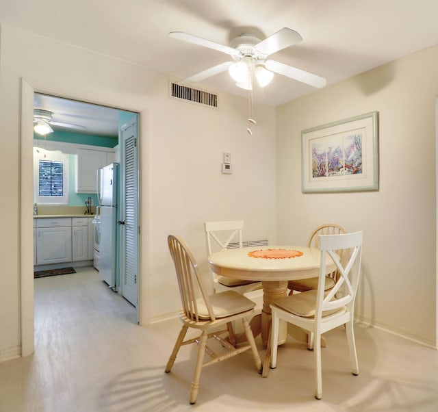 dining area featuring ceiling fan