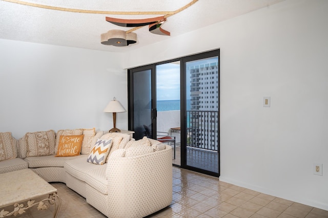 living area with a textured ceiling