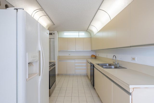 kitchen featuring black dishwasher, white refrigerator with ice dispenser, a textured ceiling, a sink, and light tile patterned flooring